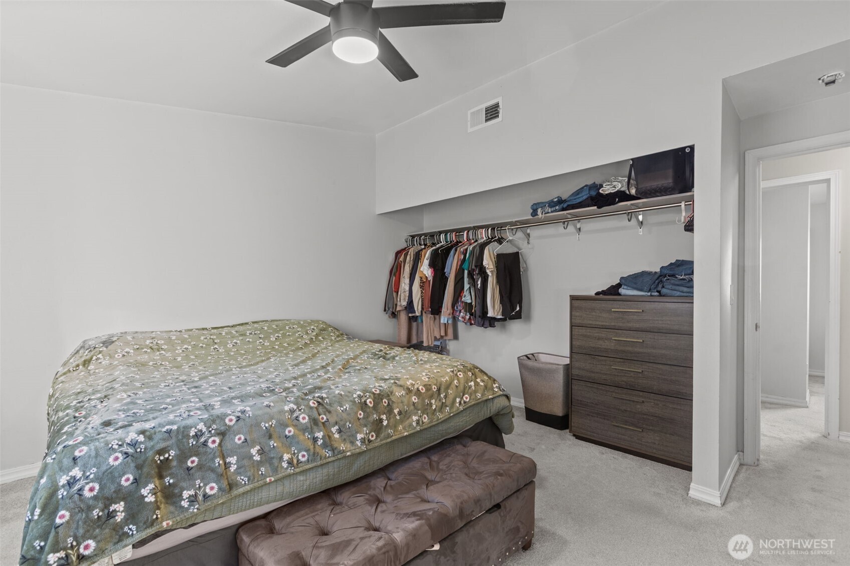 20911 Ronning Road Arlington, WA 98223 - Photo 18 of 40 a bedroom with a bed and a walk in closet