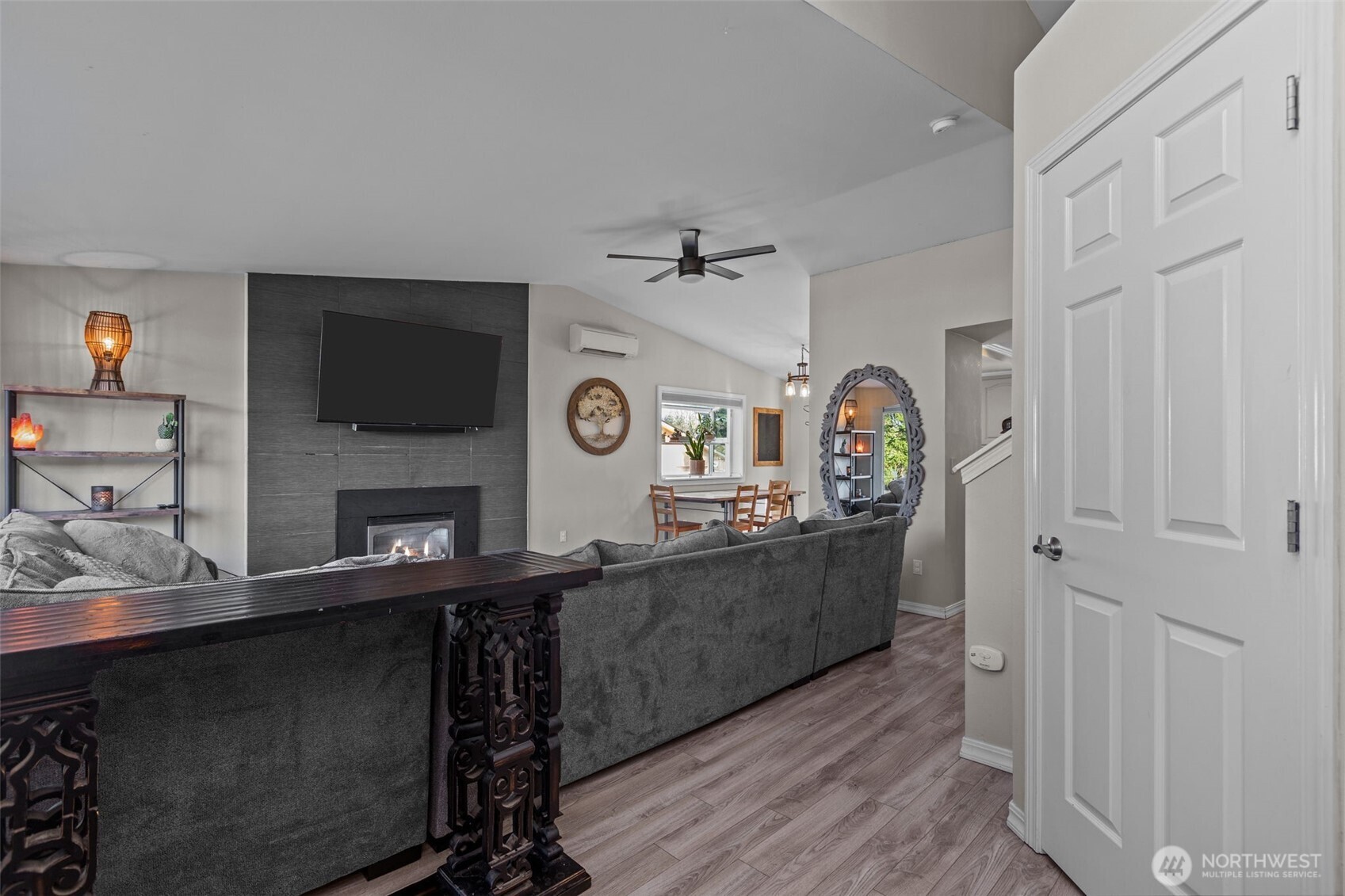 20911 Ronning Road Arlington, WA 98223 - Photo 2 of 40 a view of a workspace with furniture and wooden floor