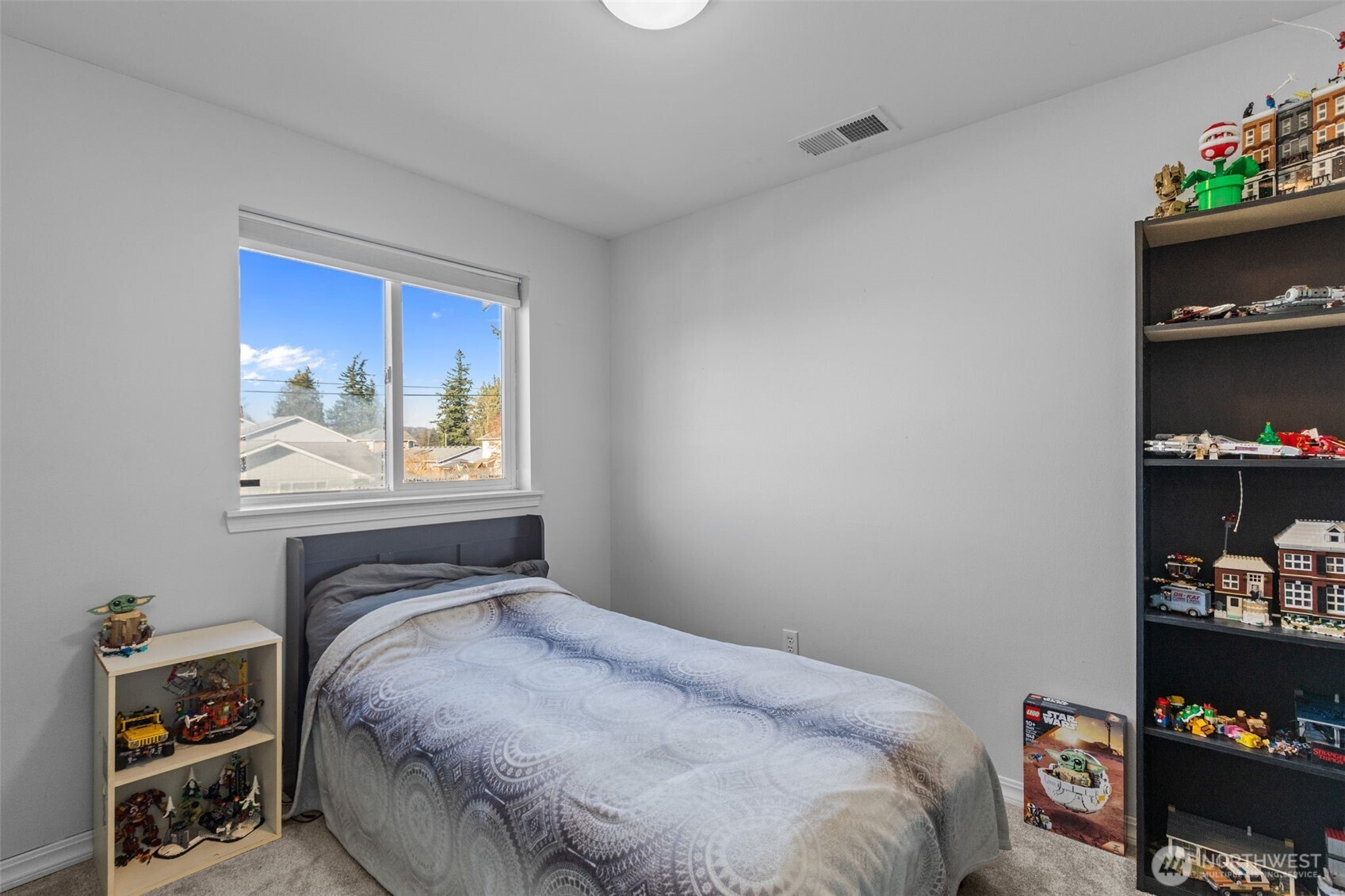 20911 Ronning Road Arlington, WA 98223 - Photo 25 of 40 a bedroom with a bed and a window