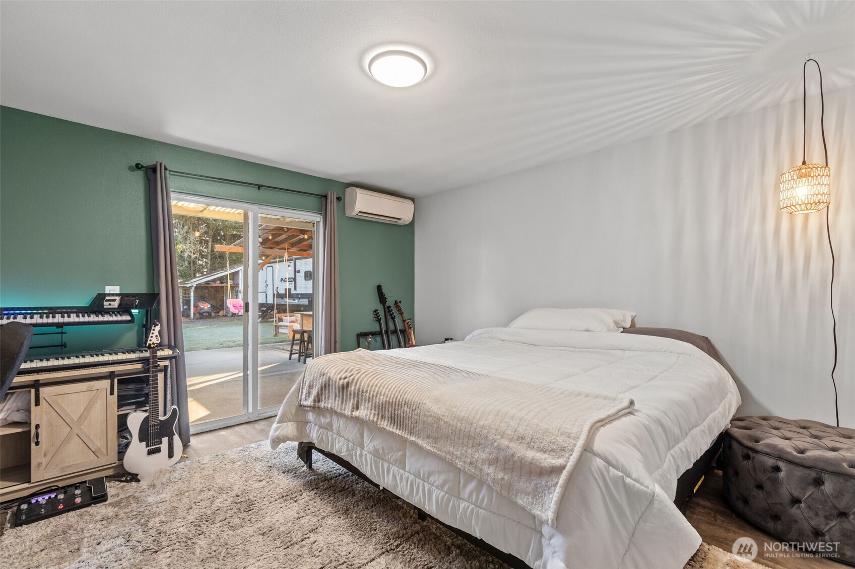 20911 Ronning Road Arlington, WA 98223 - Photo 28 of 40 a bedroom with a bed and a window