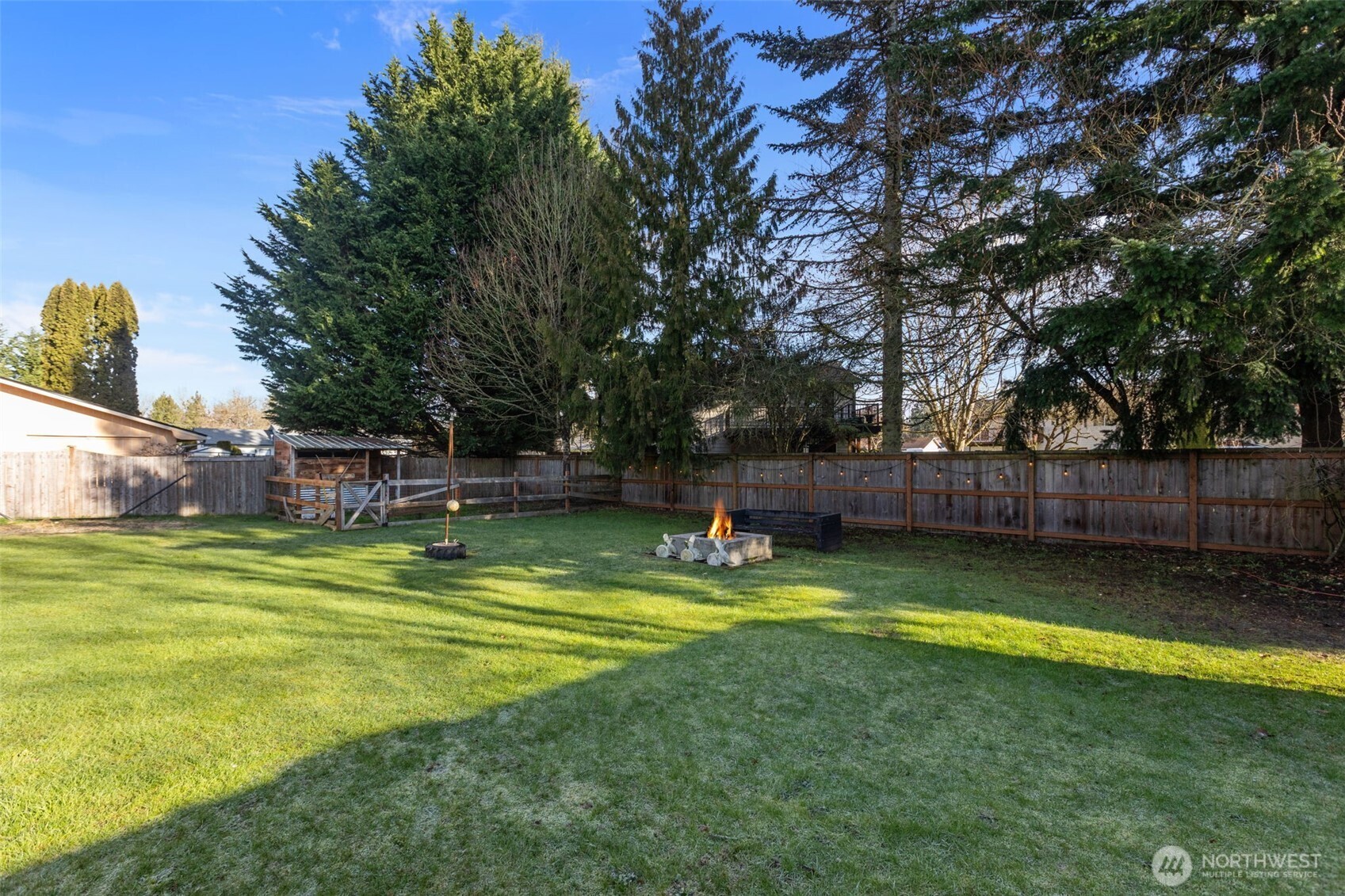 20911 Ronning Road Arlington, WA 98223 - Photo 37 of 40 a view of a swimming pool with a yard