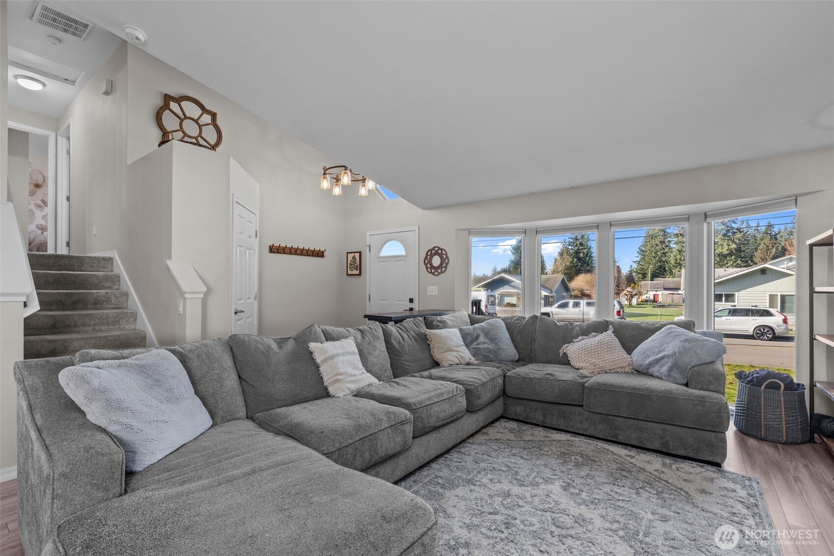 20911 Ronning Road Arlington, WA 98223 - Photo 4 of 40 a living room with furniture and a large window