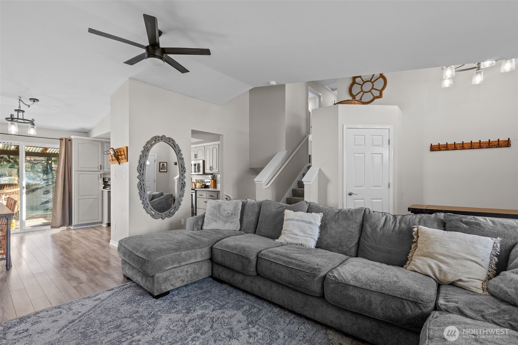 20911 Ronning Road Arlington, WA 98223 - Photo 5 of 40 a living room with furniture a rug and white walls