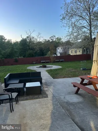 a view of a bench in a park