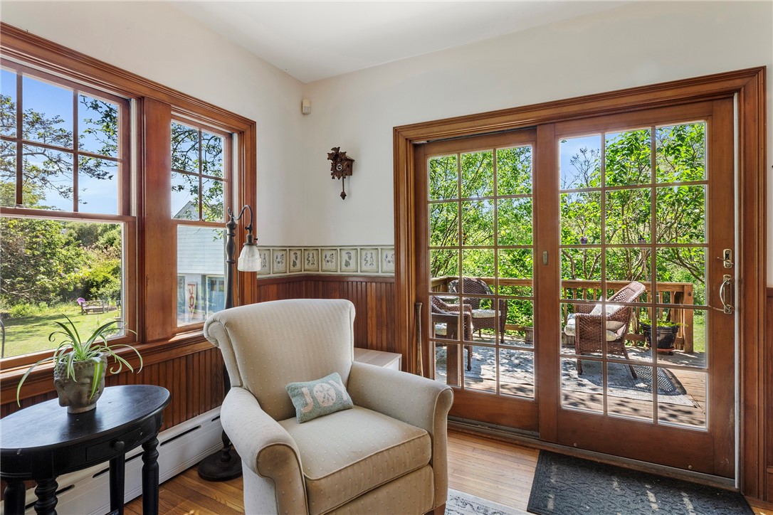 201 Paradise Avenue Middletown, RI 02842 - Photo 31 of 48 next to kitchen with sliding door out to back yard deck