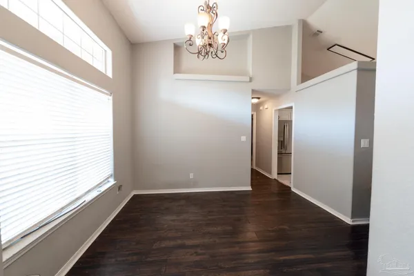 a living room with furniture fireplace and flat screen tv