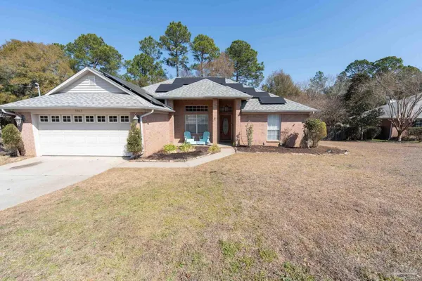a kitchen with stainless steel appliances granite countertop a refrigerator sink and stove