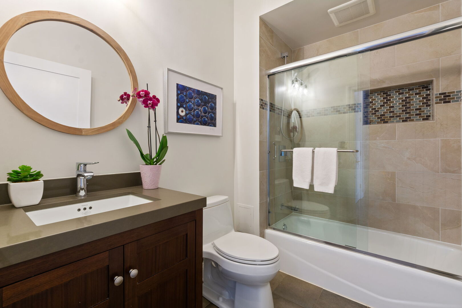 1122 North Dearborn Street, Unit 25H Chicago, IL 60610 - Photo 17 of 30 a bathroom with a sink mirror toilet and shower