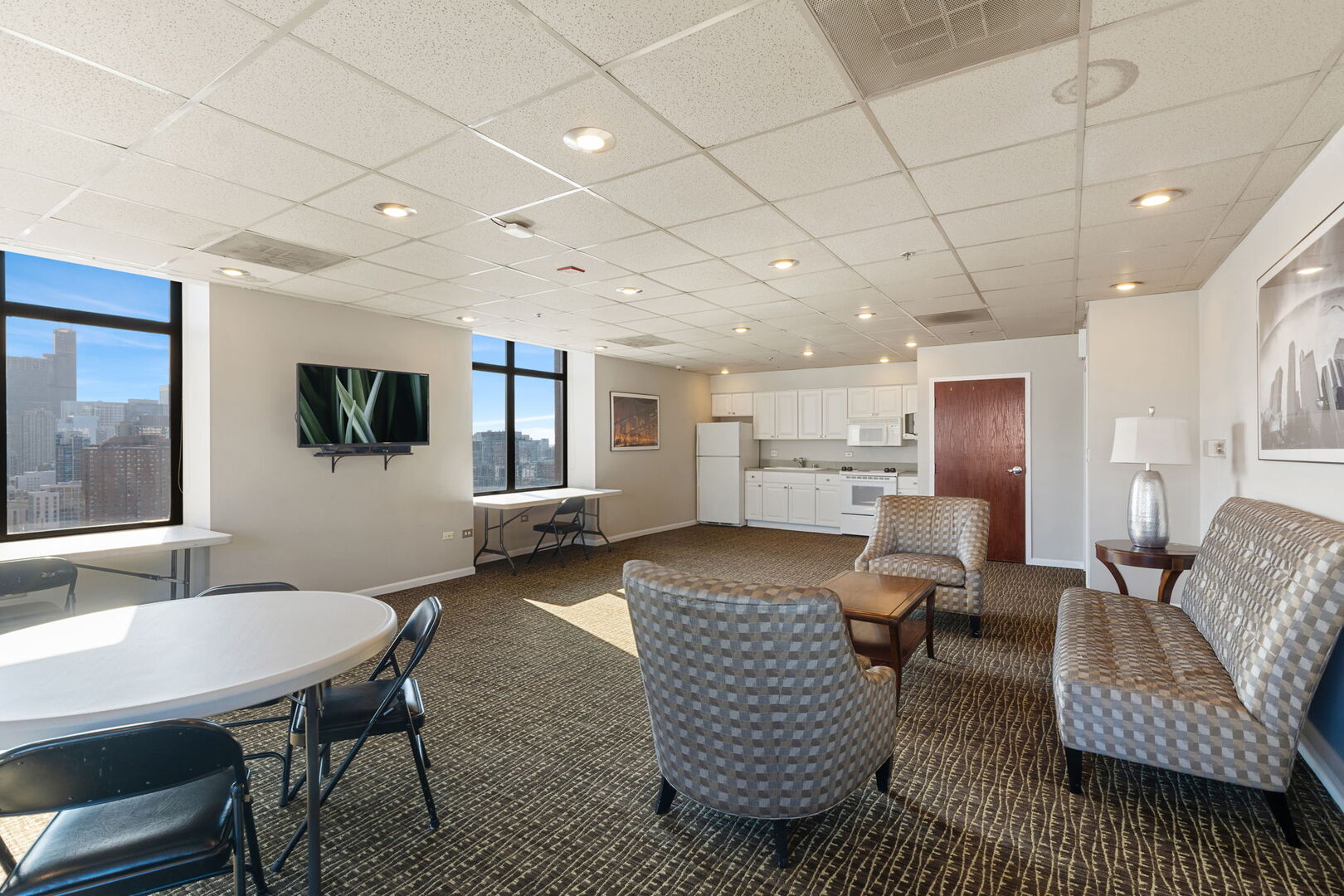 1122 North Dearborn Street, Unit 25H Chicago, IL 60610 - Photo 23 of 30 a living room with furniture and a table