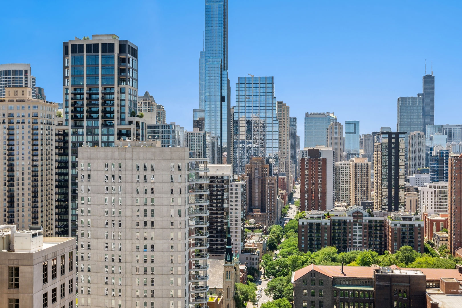 1122 North Dearborn Street, Unit 25H Chicago, IL 60610 - Photo 28 of 30 a city view with tall buildings