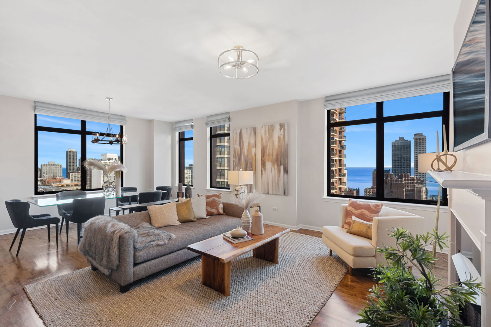 1122 North Dearborn Street, Unit 25H Chicago, IL 60610 - Photo 4 of 30 a living room with furniture and a large window
