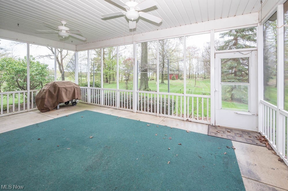 25142 Georgetown Road Homeworth, OH 44634 - Photo 32 of 35 Beautiful screened in back porch off of kitchen area/breakfast room