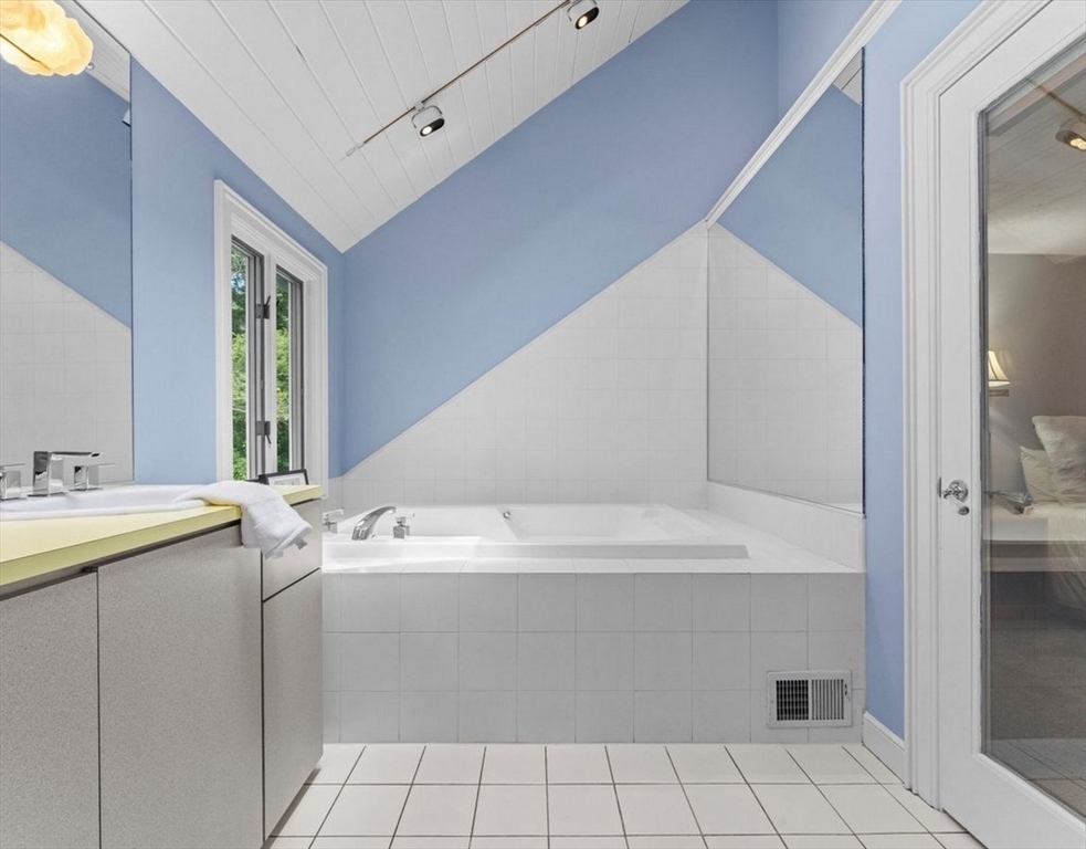 9 Pleasantview Terrace Framingham, MA 01701 - Photo 19 of 35 a bathroom with a sink and a mirror