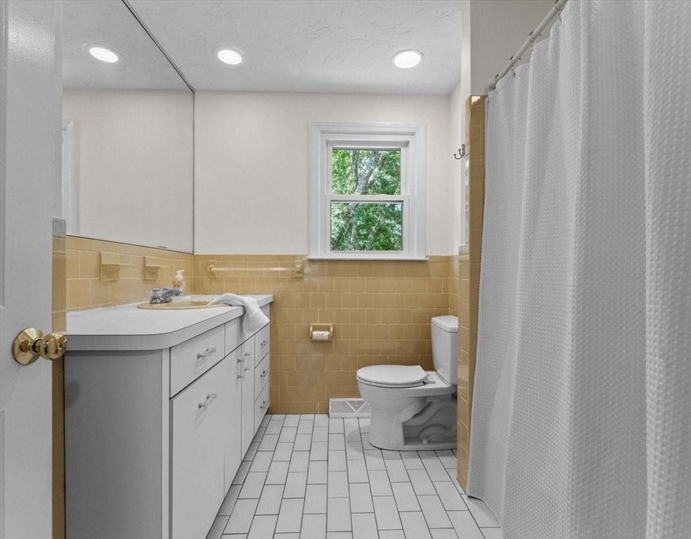 9 Pleasantview Terrace Framingham, MA 01701 - Photo 26 of 35 a bathroom with a sink toilet and shower