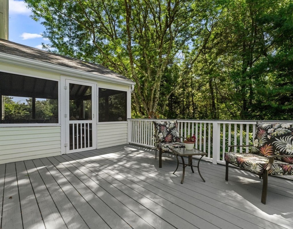 9 Pleasantview Terrace Framingham, MA 01701 - Photo 28 of 35 a balcony with view of trees and furniture