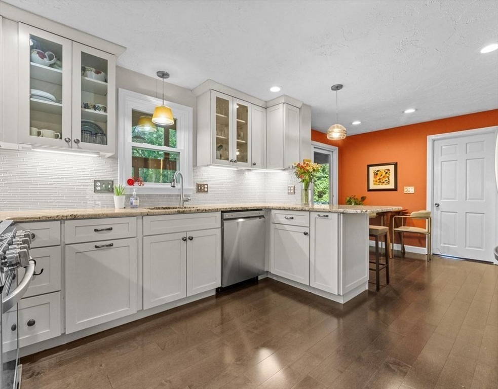 9 Pleasantview Terrace Framingham, MA 01701 - Photo 4 of 35 a kitchen with white cabinets and sink