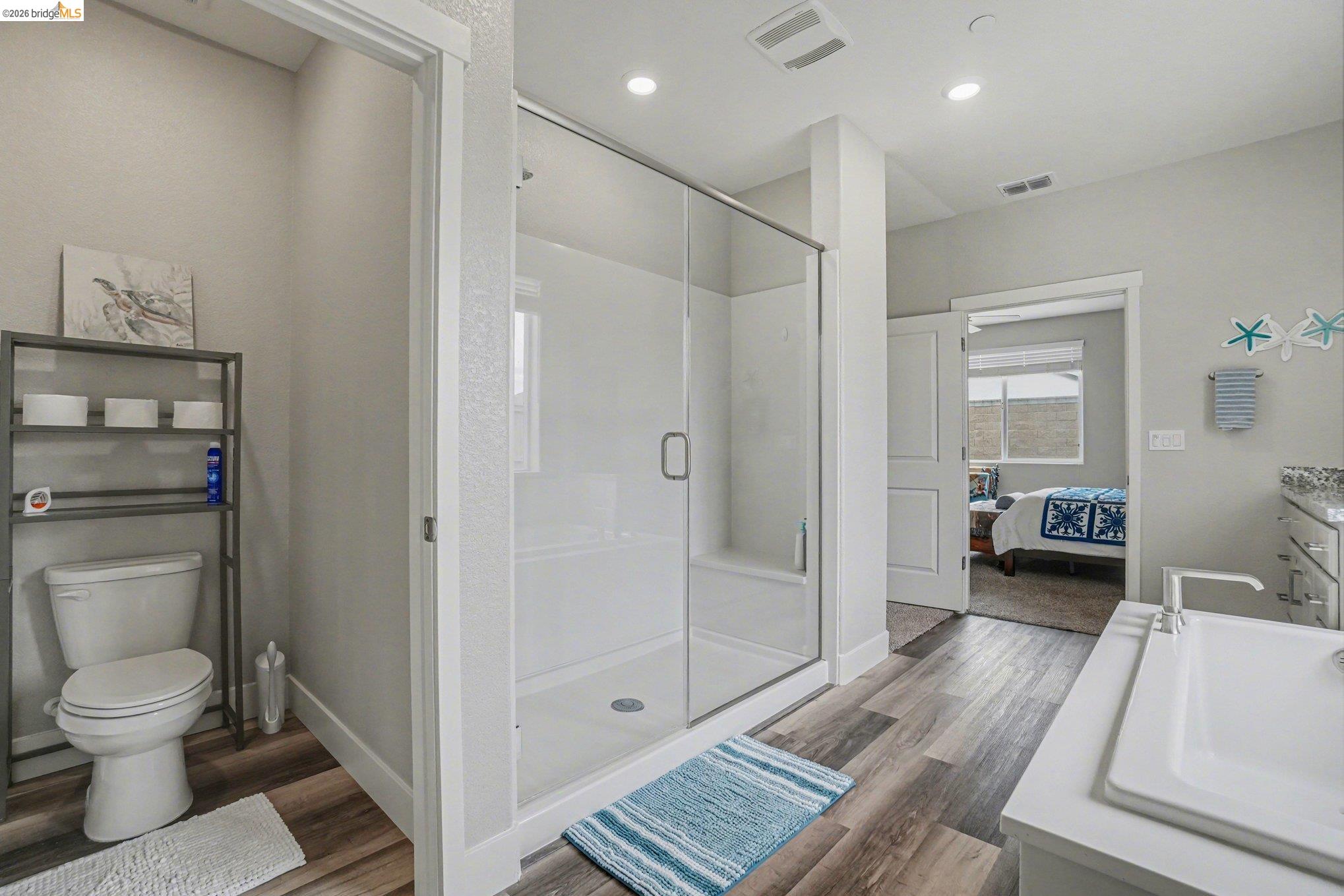 4585 Prairie Path Rio Vista, CA 94571 - Photo 18 of 45 a bathroom with a shower a toilet and a sink