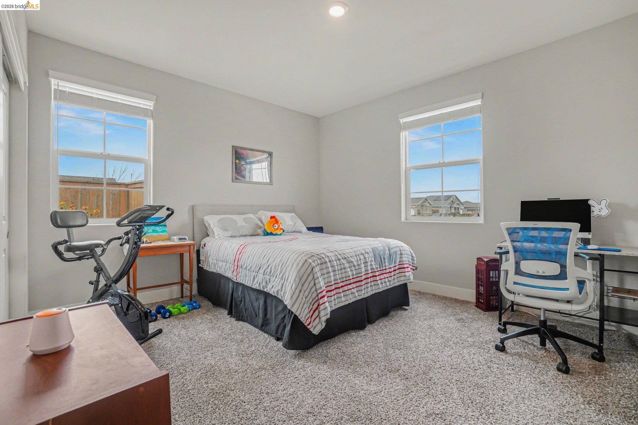 4585 Prairie Path Rio Vista, CA 94571 - Photo 21 of 45 a bedroom with a bed and a window