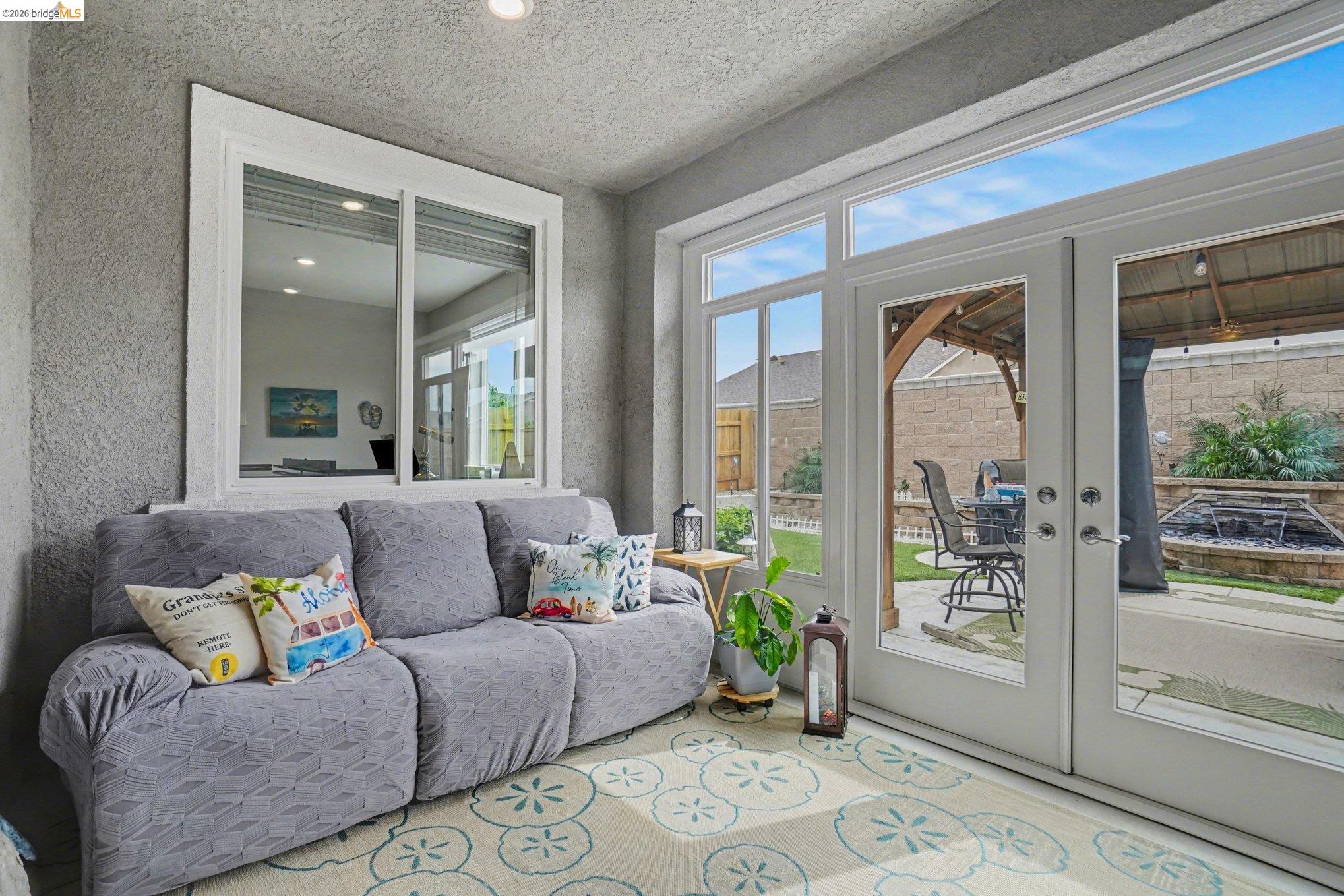 4585 Prairie Path Rio Vista, CA 94571 - Photo 24 of 45 a living room with furniture and a window