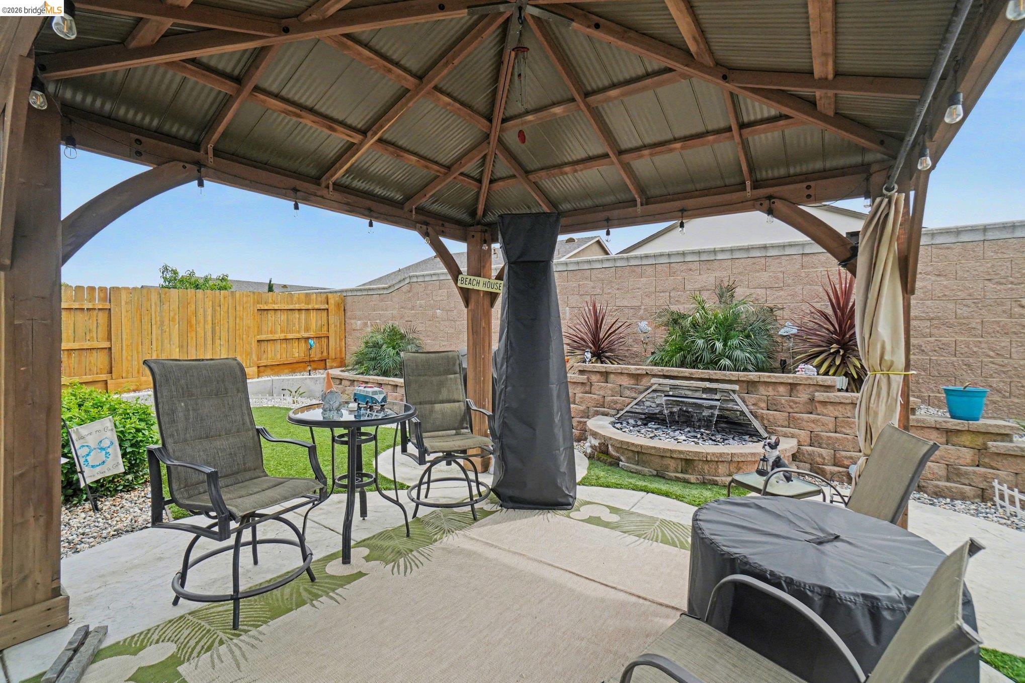 4585 Prairie Path Rio Vista, CA 94571 - Photo 30 of 45 a patio with a patio table and chairs