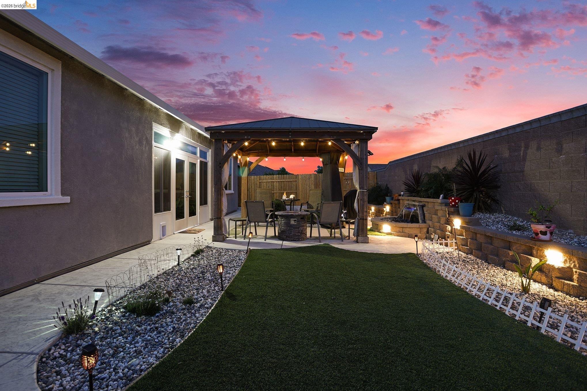 4585 Prairie Path Rio Vista, CA 94571 - Photo 36 of 45 a view of a patio with table and chairs and potted plants