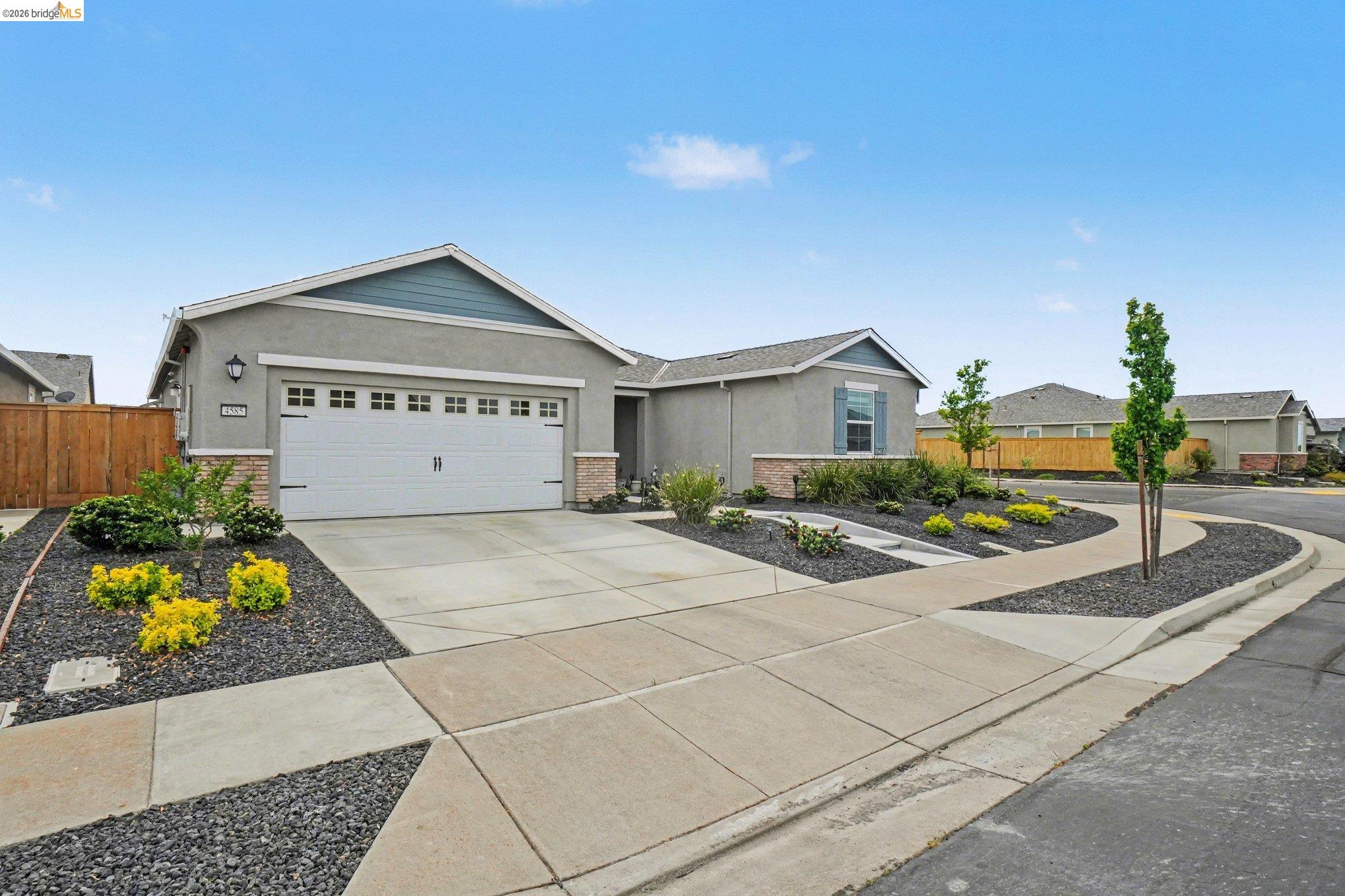 4585 Prairie Path Rio Vista, CA 94571 - Photo 44 of 45 a front view of a house with a garden