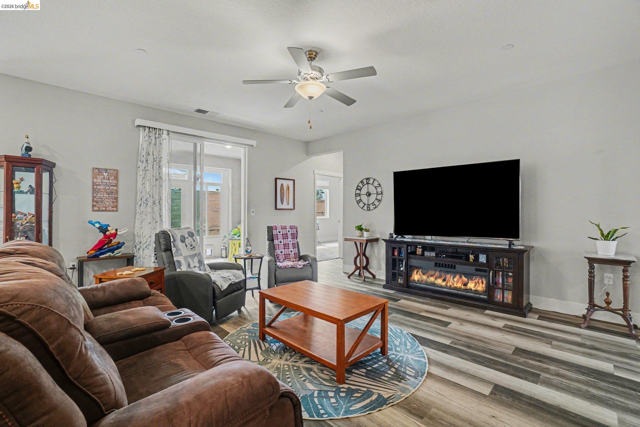 4585 Prairie Path Rio Vista, CA 94571 - Photo 5 of 45 a living room with furniture and a flat screen tv