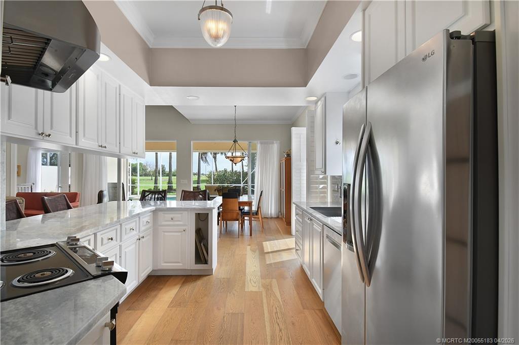 1494 Southwest Balmoral Trace Stuart, FL 34997 - Photo 19 of 45 View from Foyer of SS Appliances