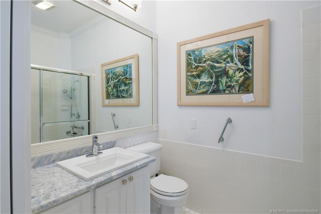 1494 Southwest Balmoral Trace Stuart, FL 34997 - Photo 30 of 45 His Master Bathroom with Granite counter