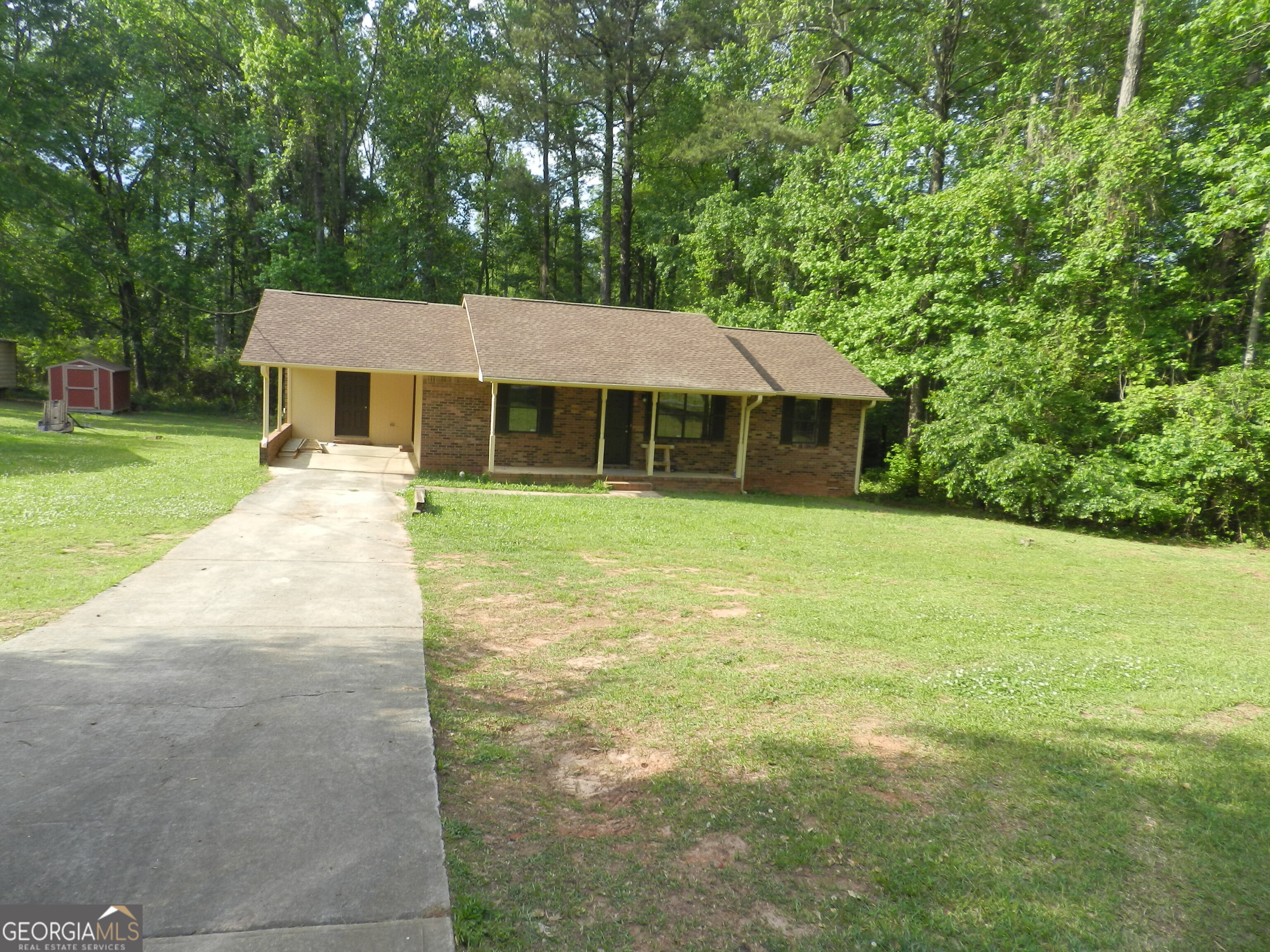 359 Swint Road Griffin, GA 30224 - Photo 1 of 1 a house view with a garden space