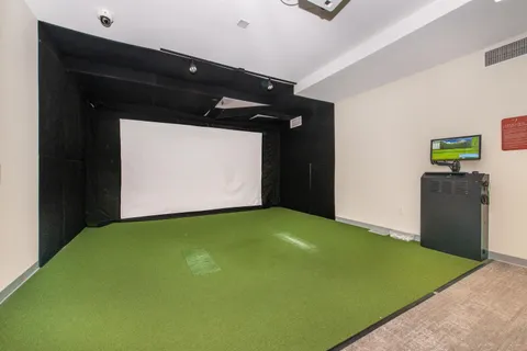 a view of room with window and garage