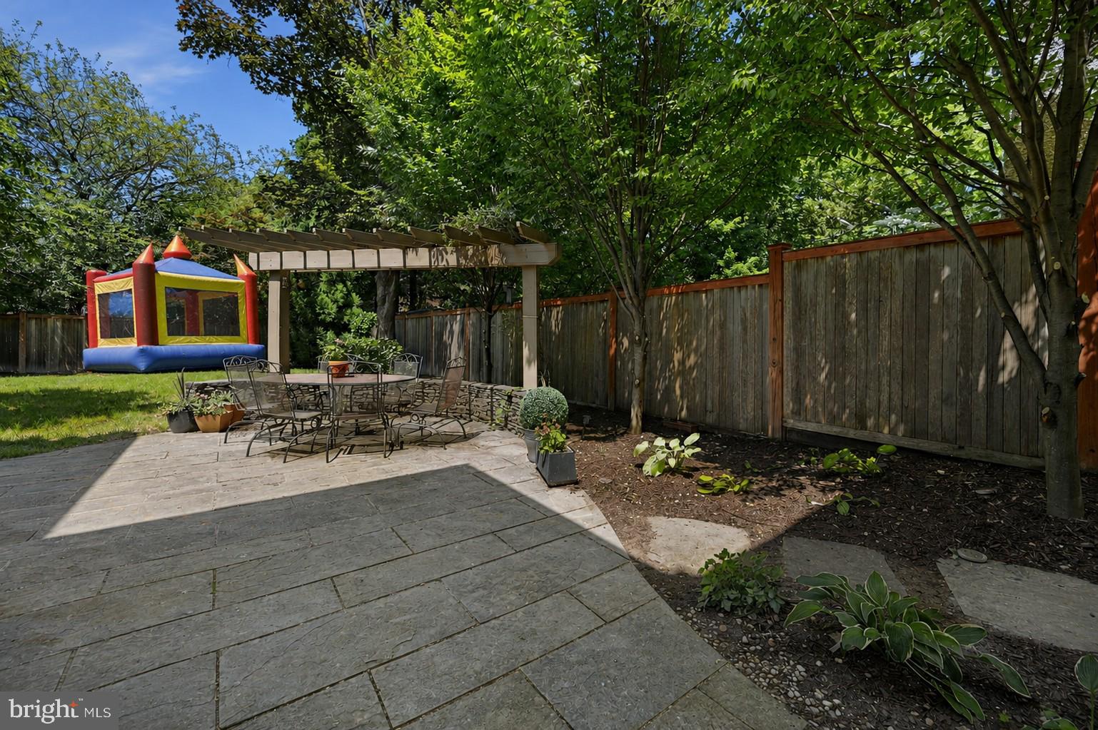 3707 Military Road Northwest Washington, DC 20015 - Photo 55 of 57 Bouncy house virtually staged, but one does convey