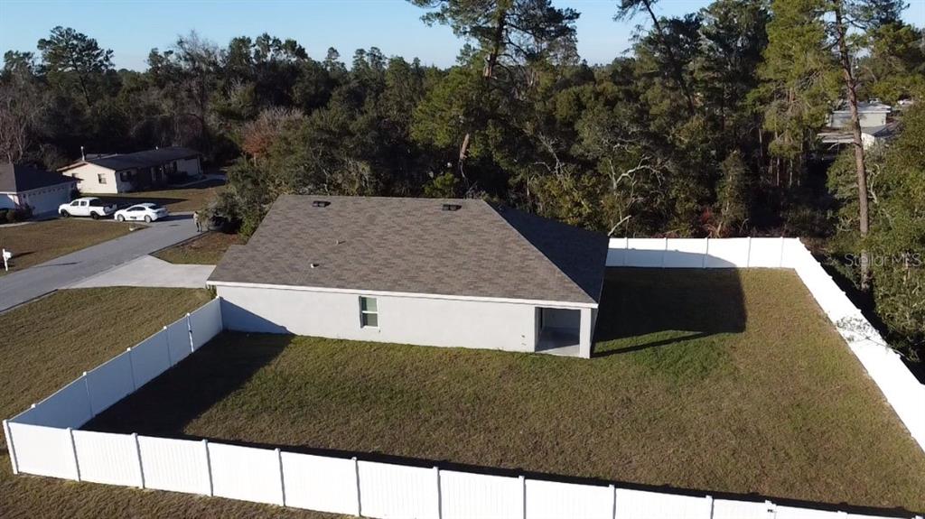 15253 Southwest 28th Avenue Road Ocala, FL 34473 - Photo 13 of 13 a view of a house with a yard