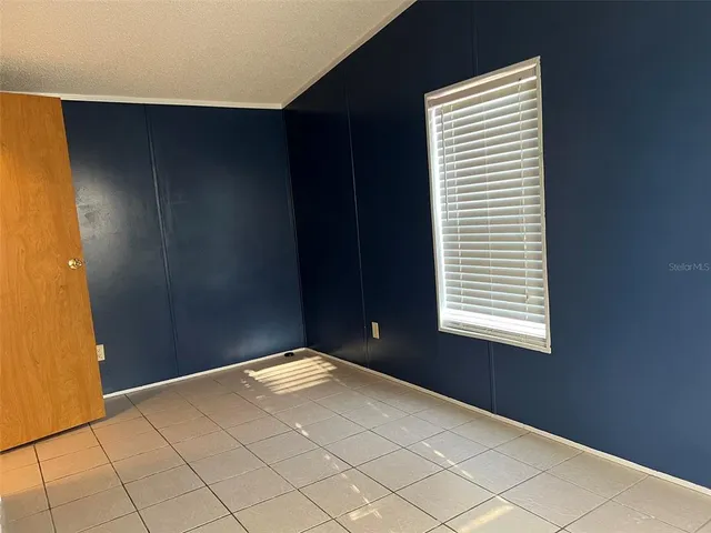 a view of empty room and window