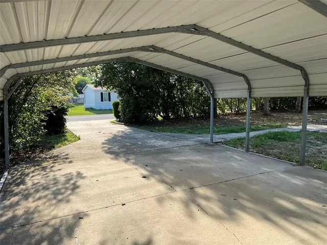 a view of a house with a street
