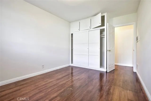 a bathroom with a bathtub a shower and a window