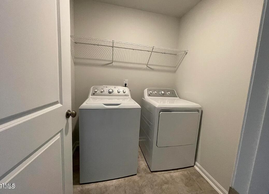 244 Paramount Drive Smithfield, NC 27577 - Photo 5 of 16 a utility room with dryer and washer