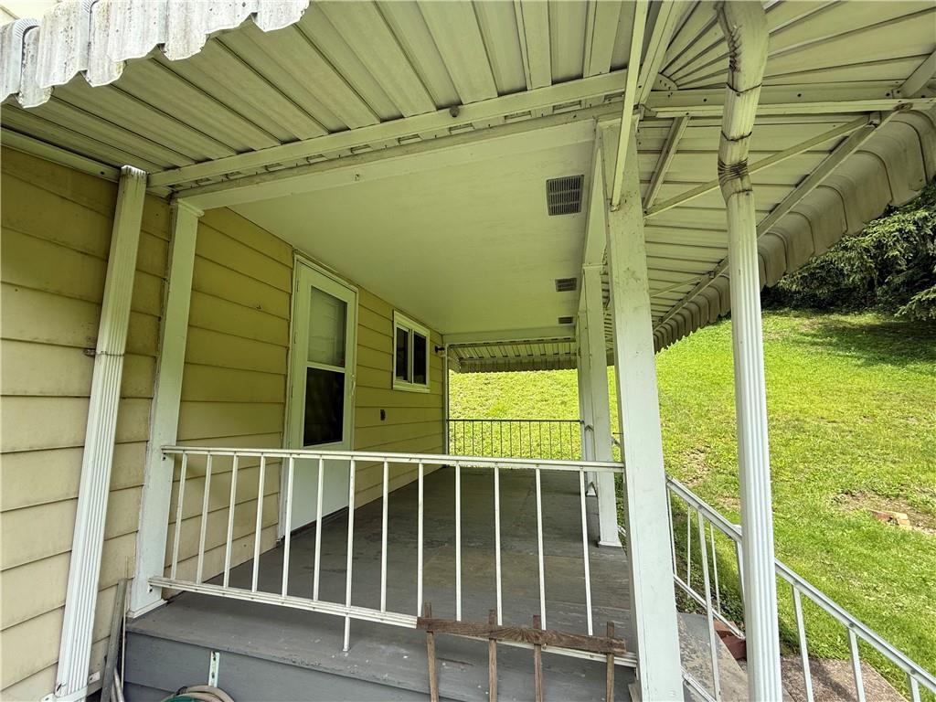 201 Cowanshannock Road Kittanning, PA 16201 - Photo 9 of 25 Nice covered Side porch off kitchen