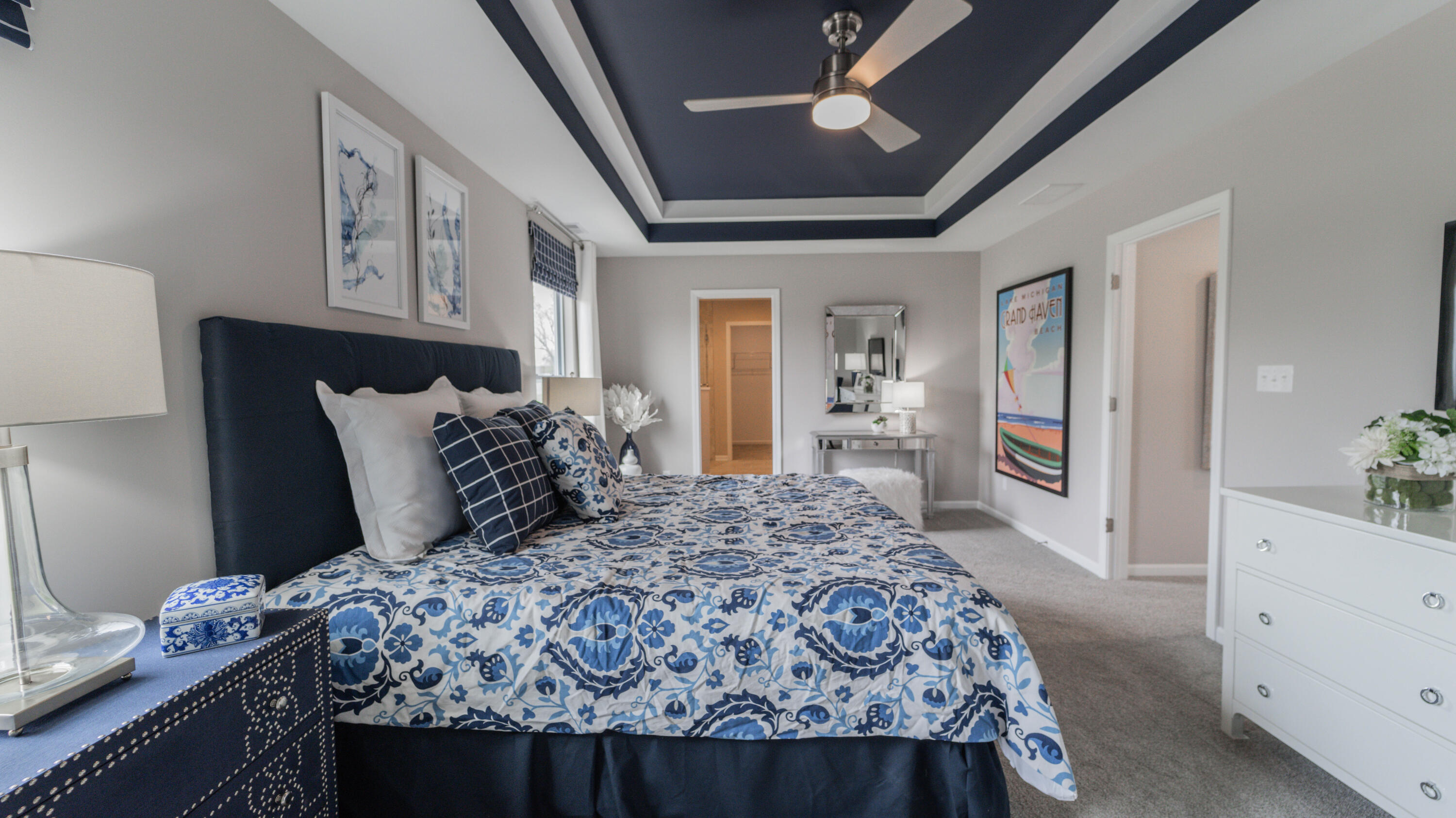 5657 Burr Rdg Circle Crown Point, IN 46307 - Photo 19 of 23 a bedroom with a large bed and a chandelier