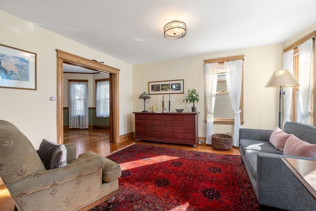 89 Bromfield Road Somerville, MA 02144 - Photo 17 of 41 a living room with furniture and a window