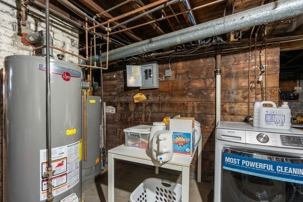 89 Bromfield Road Somerville, MA 02144 - Photo 28 of 41 a roof deck with a chair and potted plant