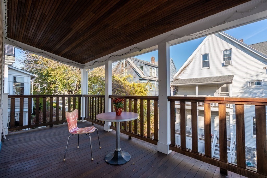 89 Bromfield Road Somerville, MA 02144 - Photo 29 of 41 a view of a two chairs in the balcony