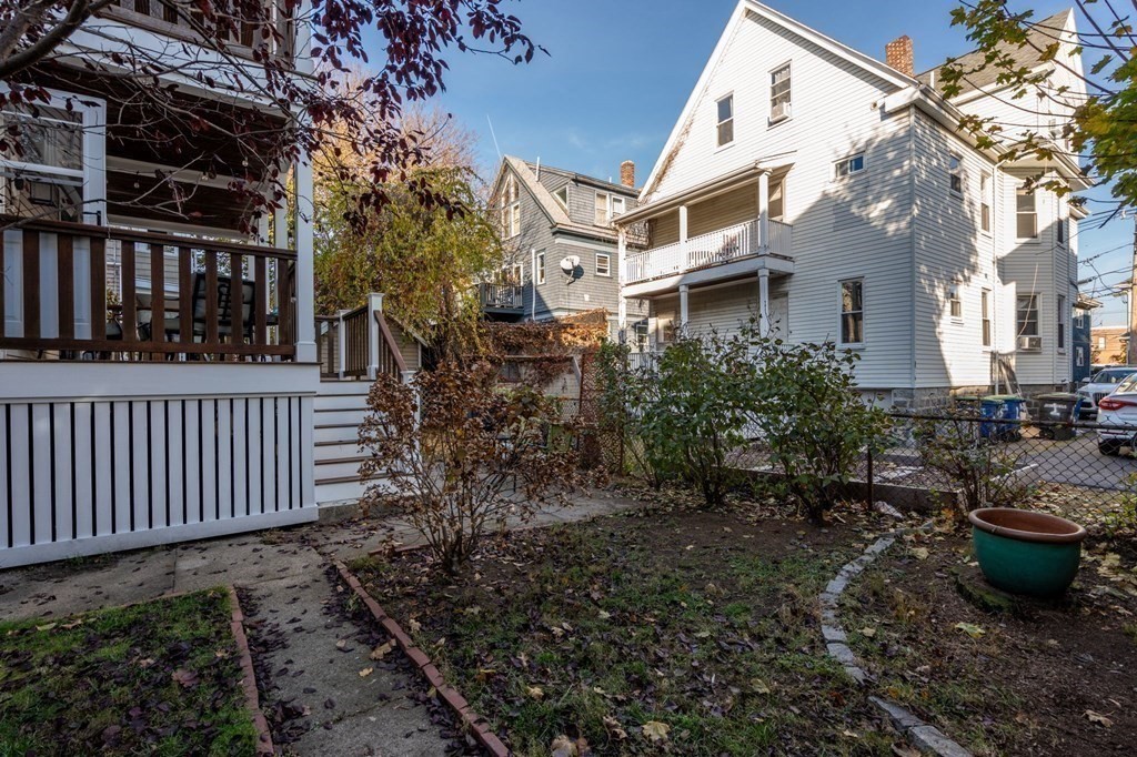 89 Bromfield Road Somerville, MA 02144 - Photo 34 of 41 a view of a house with backyard and porch