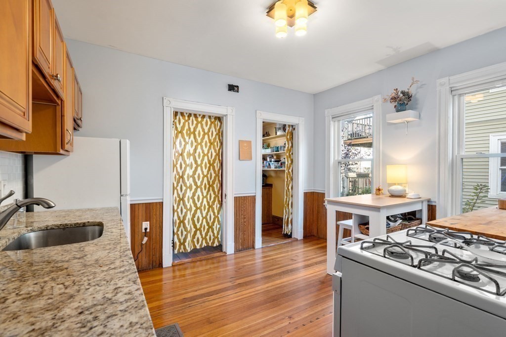 89 Bromfield Road Somerville, MA 02144 - Photo 5 of 41 a kitchen with a stove and a sink