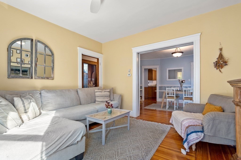 89 Bromfield Road Somerville, MA 02144 - Photo 8 of 41 a living room with furniture and a window