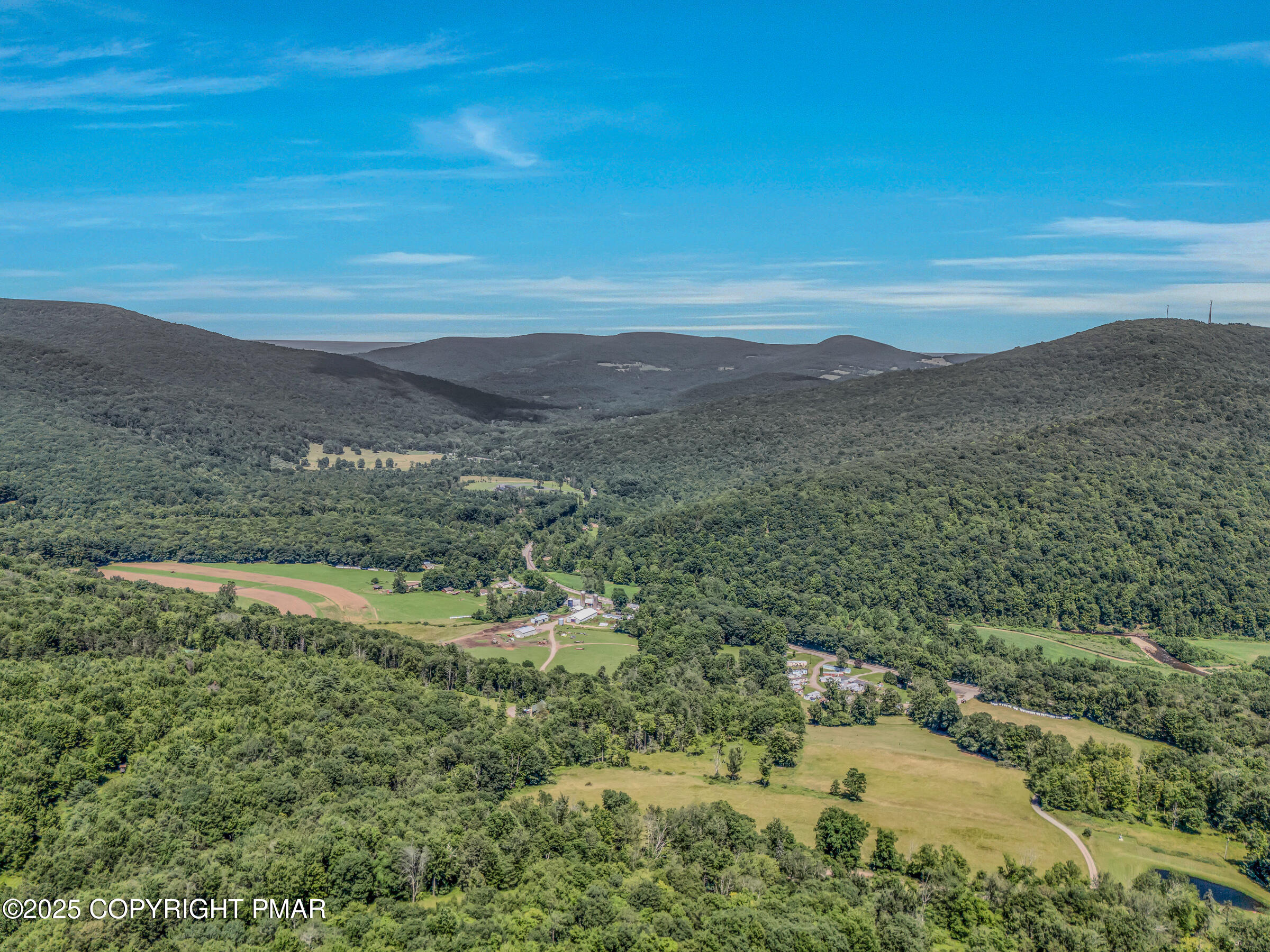 261 Hall Lane Tunkhannock, PA 18657 - Photo 11 of 23 a view of a mountain with an outdoor space