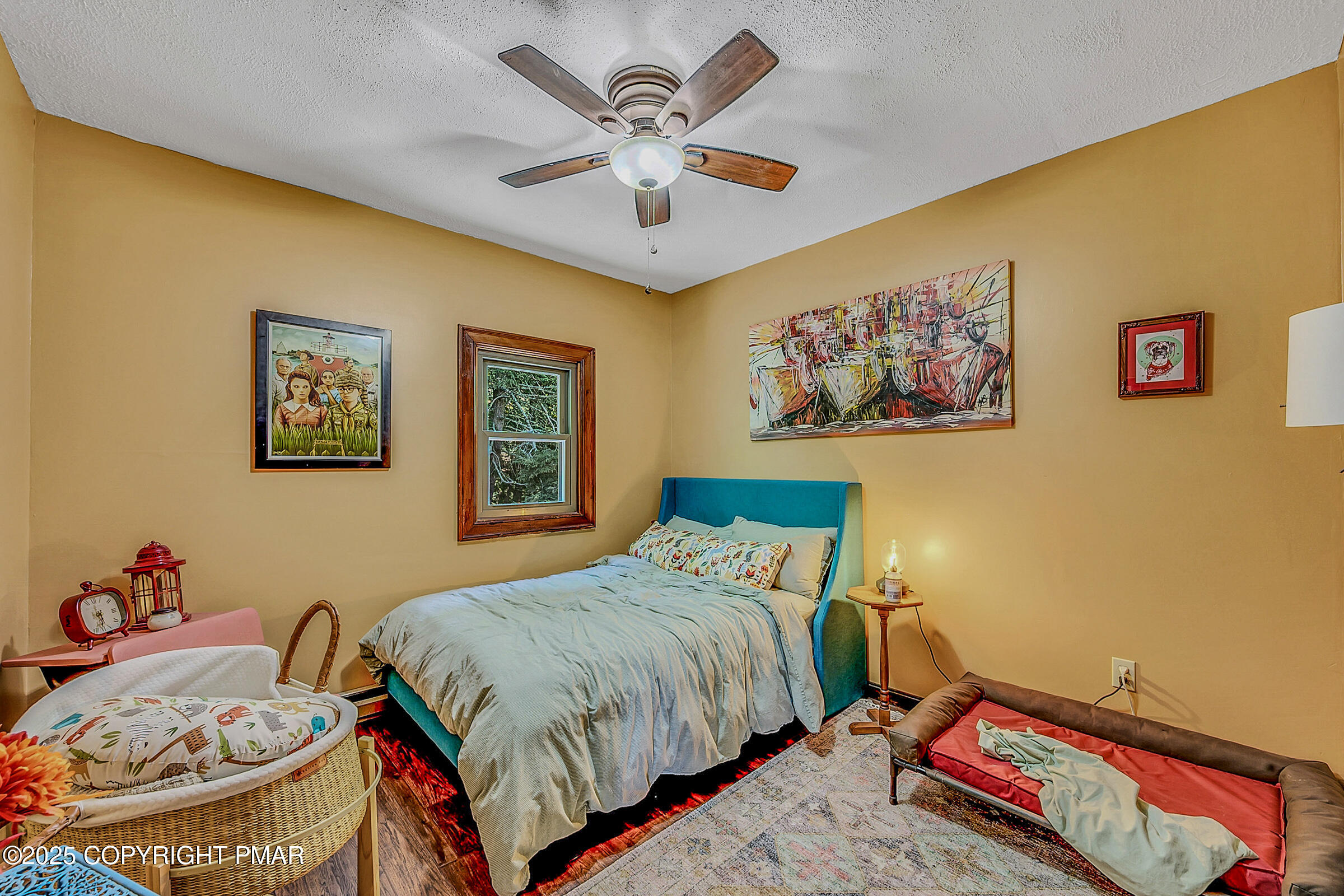261 Hall Lane Tunkhannock, PA 18657 - Photo 23 of 23 a bedroom with a bed and a painting on the wall