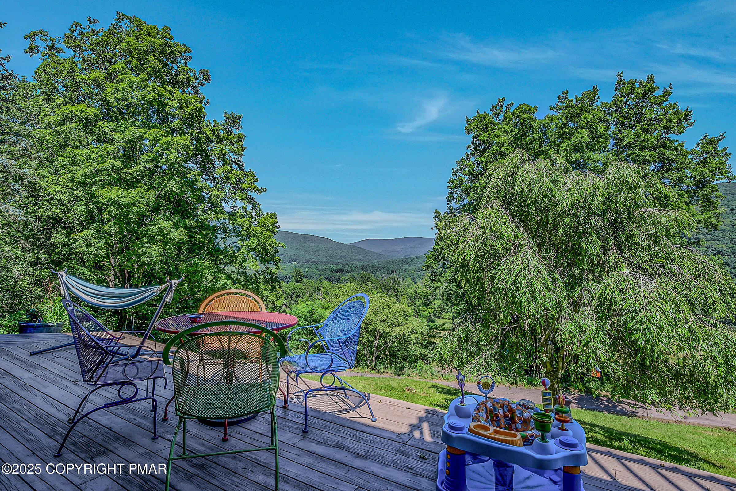 261 Hall Lane Tunkhannock, PA 18657 - Photo 4 of 23 an outdoor space with furniture and umbrella