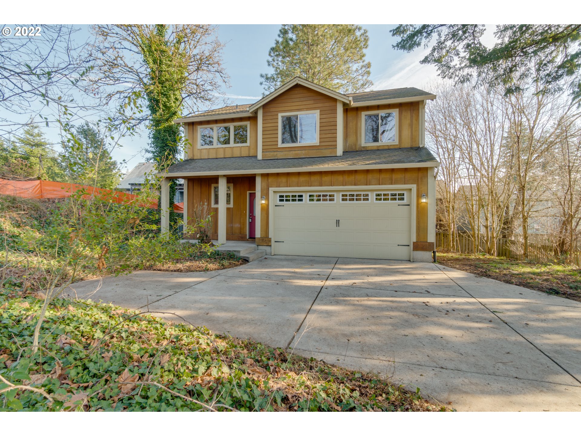 640 Southwest Trout Court Camas, WA 98607 - Photo 1 of 32 a front view of a house with a yard and garage