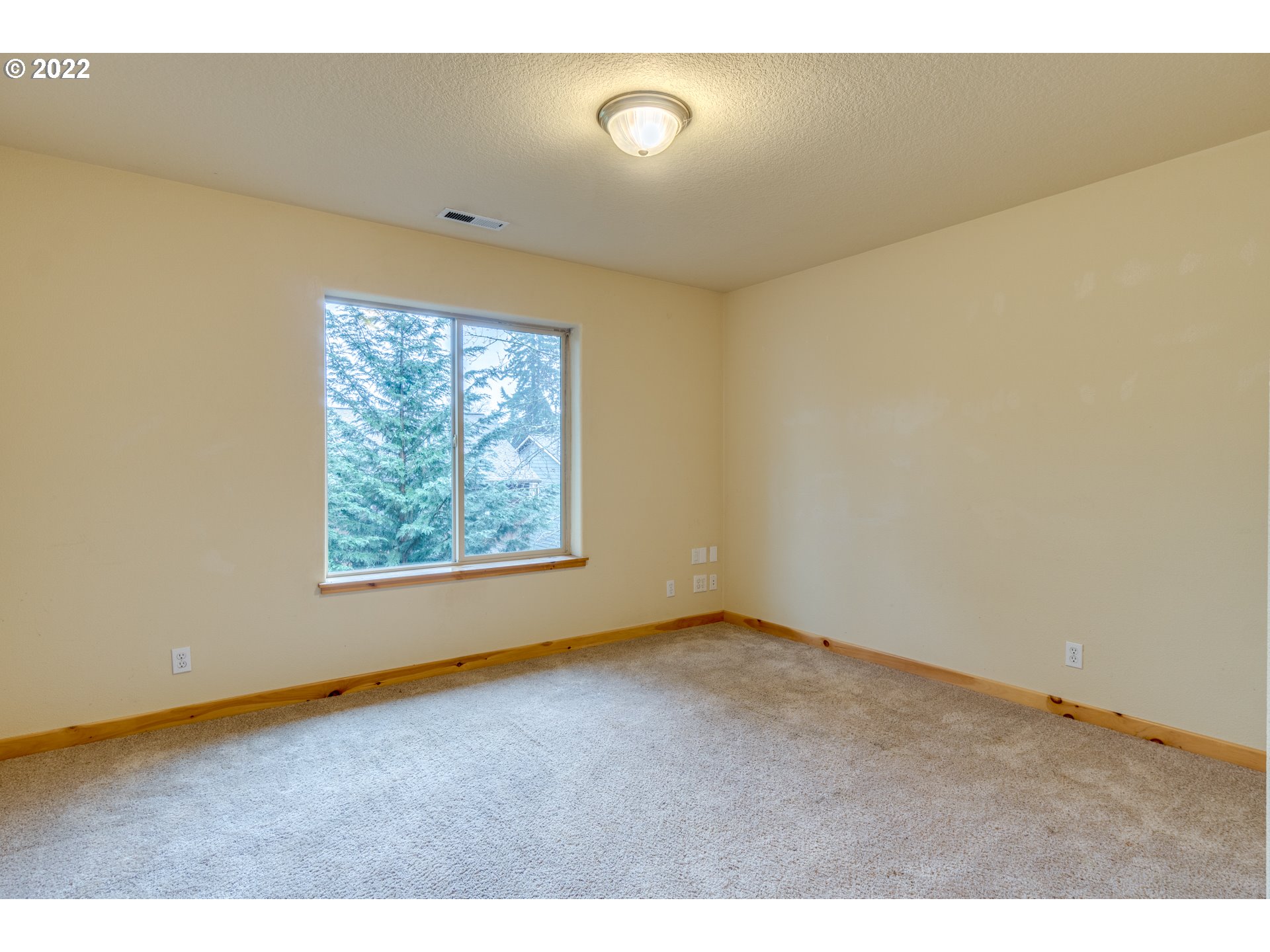 640 Southwest Trout Court Camas, WA 98607 - Photo 19 of 32 a view of an empty room with a window